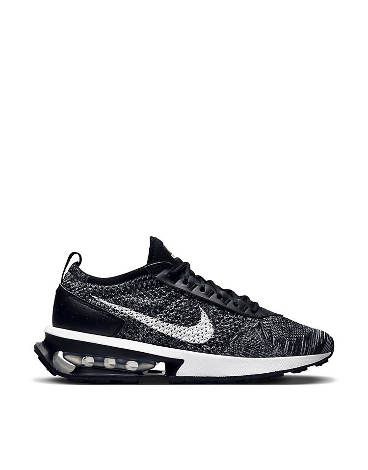 Nike Air Max Flyknit Racer sneakers in black and white